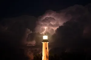Red Lightning Strike At Lighthouse Wallpaper
