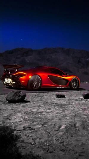 Red P1 Mclaren Iphone At Mountain Wallpaper