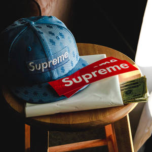 Red Supreme Logo And Cap Wallpaper