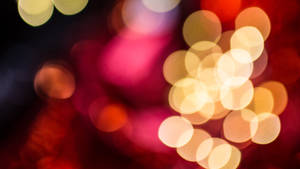 Red Yellow Holographic Christmas Bokeh Wallpaper