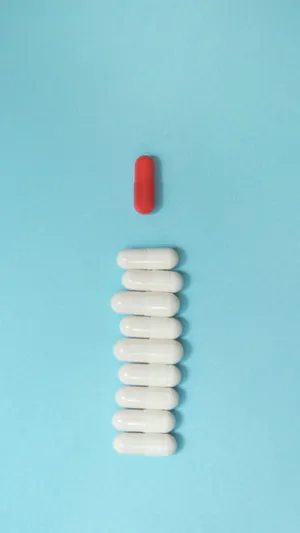 Redand White Capsulewith White Pills Wallpaper