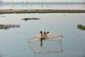 Residents Fishing In The Rivers Of Mandalay Wallpaper