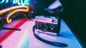 Retro Aesthetic Rollei Film Camera Wallpaper