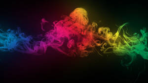 Revel In The Swirling Beauty Of Colorful Smoke Wallpaper