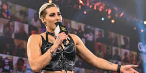 Rhea Ripley Speaking W W E Event Wallpaper