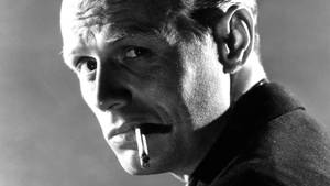 Richard Widmark: A Rare Picture In Classic Hollywood Era Wallpaper