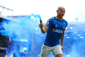 Richarlison De Andrade Holding Smoke Flare Wallpaper