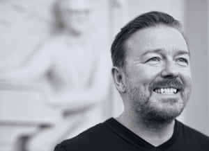 Ricky Gervais, Bringing Laughter And Joy To Millions Wallpaper