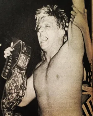 Ricky Morton Celebrating Victorywith Belt Wallpaper