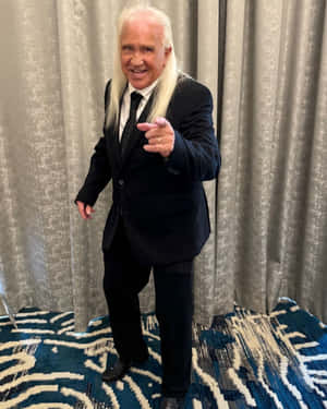 Ricky Morton Pointingat Camera Wallpaper