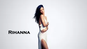 Rihanna In Classy White Dress Wallpaper