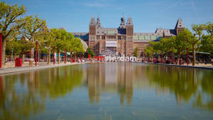 Rijksmuseum With Clear Pond Wallpaper