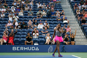 Rising Star Coco Gauff In Action At The Us Open Wallpaper