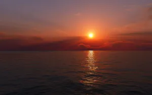 Rising Sun Shining On Dark Water Wallpaper