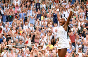 Rising Tennis Star Coco Gauff In Action Wallpaper