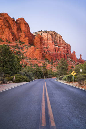 Road Beside Steep Plateau Wallpaper