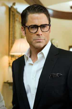 Rob Lowe Looking Dapper In A Dark Suit. Wallpaper