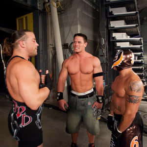 Rob Van Dam With John Cena And Rey Mysterio Wallpaper