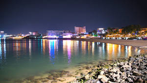 Rocky Pattaya Shore At Night Wallpaper