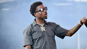 Roddy Ricch Performing Live On Stage Wallpaper