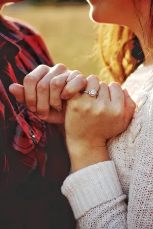 Romantic Couple Entangled Pinky Fingers Wallpaper