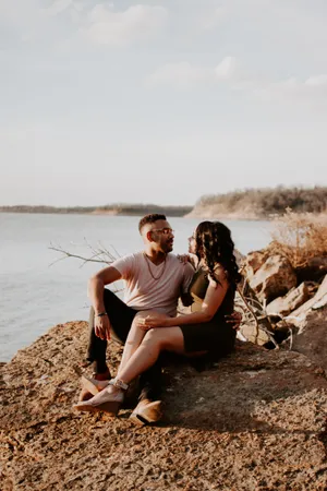 Romantic Couple Looking At Each Other Wallpaper