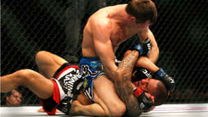 Rory Macdonald Mounting A Fighter Wallpaper