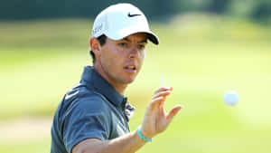 Rory Mcilroy Catching The Ball Wallpaper