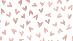 Rose Gold Desktop With Hearts Wallpaper