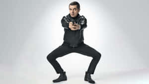 Rowan Atkinson Action Pose Wallpaper