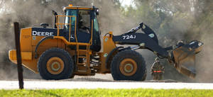 Rugged, Reliable John Deere Loader In Action Wallpaper