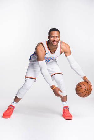 Russell Westbrook Dribbling Ball Portrait Wallpaper