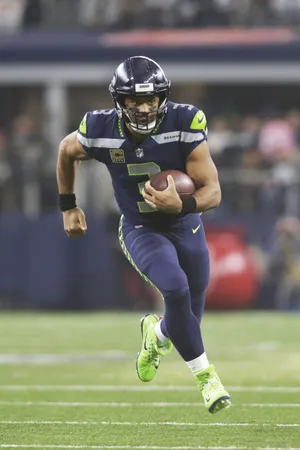 Russell Wilson Full Body Running Wallpaper