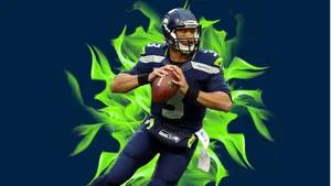 Russell Wilson In Front Of Green Flames Wallpaper