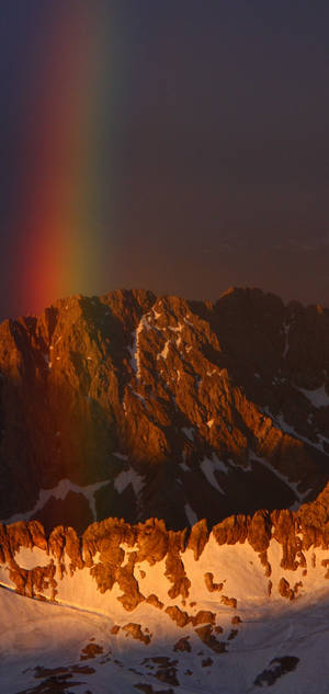 S10 Rainbow On Snow Mountain Wallpaper