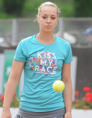 Sabine Lisicki Looking At Ball Wallpaper