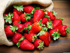 Sack Of Strawberries Wallpaper