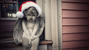 Sad Angel Figure For Gothic Christmas Wallpaper