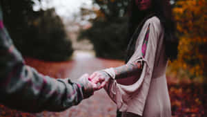 Sad Couple Holding Hands Wallpaper