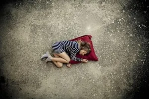 Sad Love Girl On Red Pillow Wallpaper