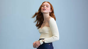 Sadie Sink In Light Blue Setting Wallpaper