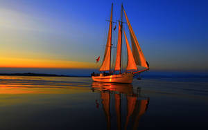 Sailing The Sun's Reflection Wallpaper