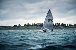 Sailing White Sloop Wallpaper