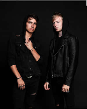 Sam And Colby Exploring A Field Wallpaper