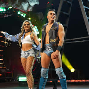 Sammy Guevara With Fellow Wrestler And Wife Tay Melo Wallpaper