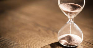 Sand Timer On Table Tiempo Background Wallpaper