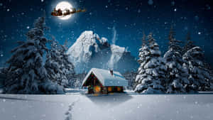 Santa Claus Flying Over A Snowy Cabin Wallpaper