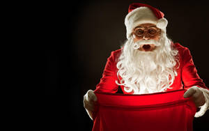 Santa Claus With Gift Bag Wallpaper