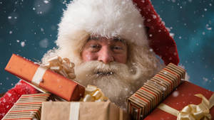 Santa Claus With Presents Wallpaper