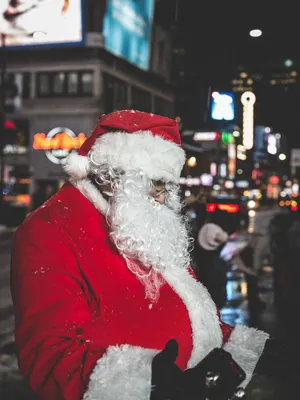 Santa In Red Christmas Outfit Wallpaper